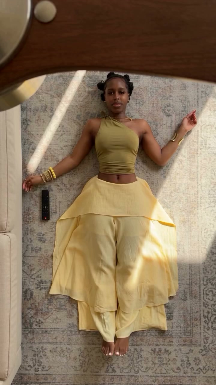 Ceiling Fan AI reference with four outfits revealed beneath a rotating wooden fan