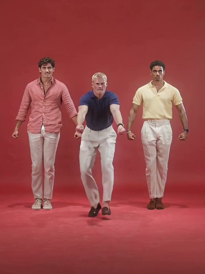The dancers changing direction while keeping the red studio formation