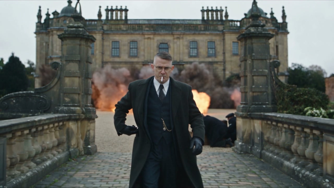 Community reference showing a foreground lead walking away from an exploding estate